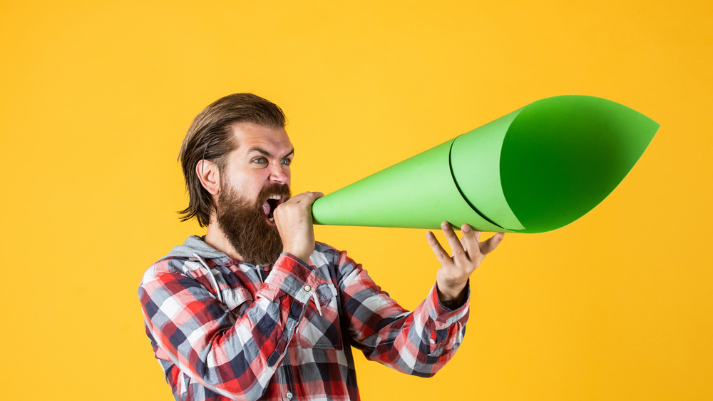 Activist shouting into a megaphone