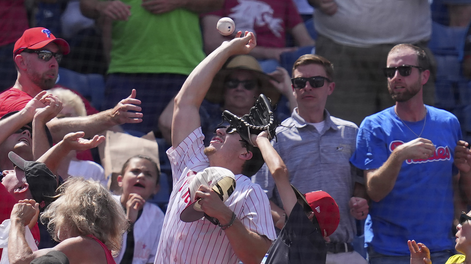 the-wildest-fly-balls-ever-caught-by-baseball-fans