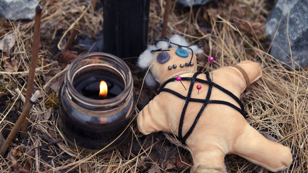 Candles and Voodoo doll