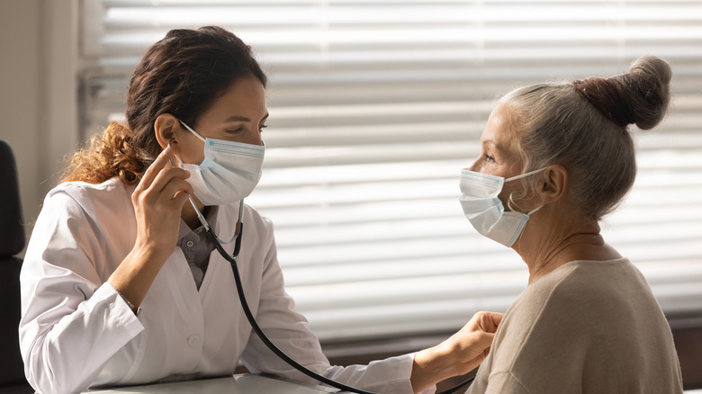 Doctor with older woman