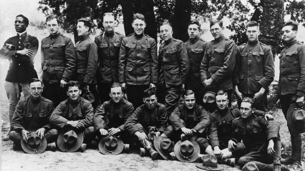 Eugene Bullard, left back, poses with a group of French comrades