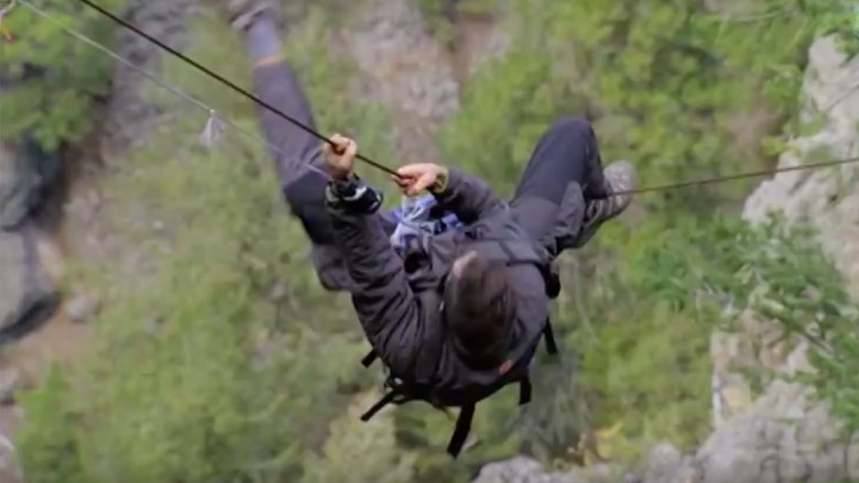 Bear Grylls on a zip line