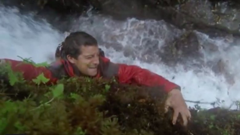 Bear Grylls over a raging river