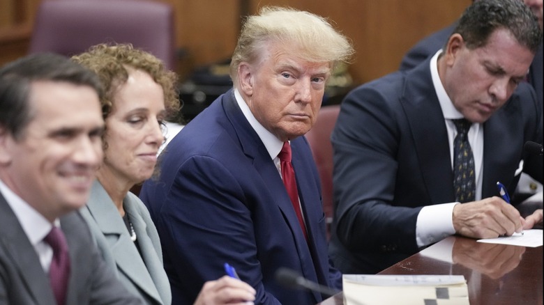 Donald Trump sitting in courtroom