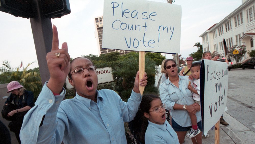 African-American protesters turned out in numbers to demonstrate against balloting problems in the county. (2000)