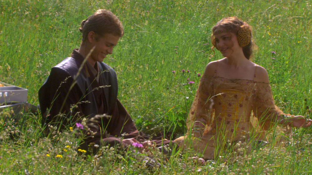 attack of the clones, anakin and padme in a field