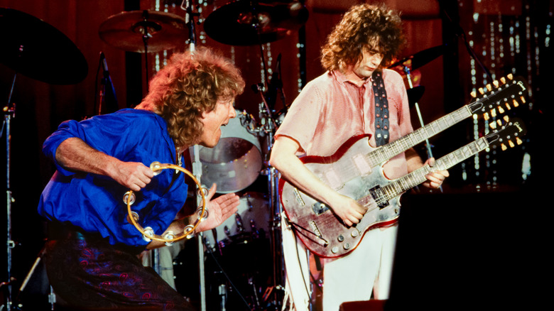 Led Zeppelin playing on stage at Live Aid in 1985