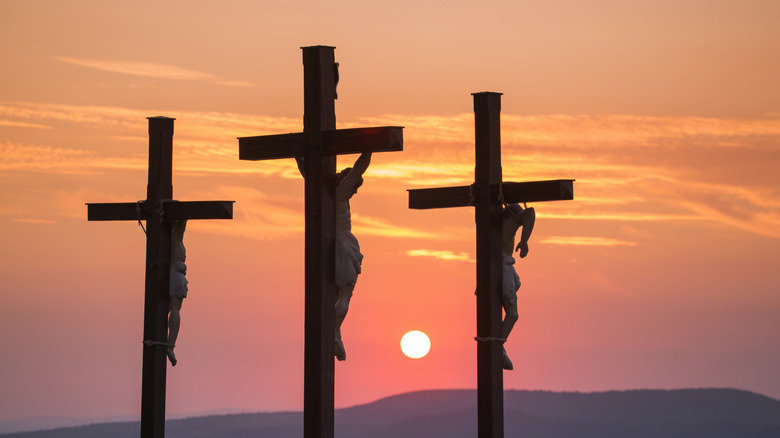 A statue representing three crucified people