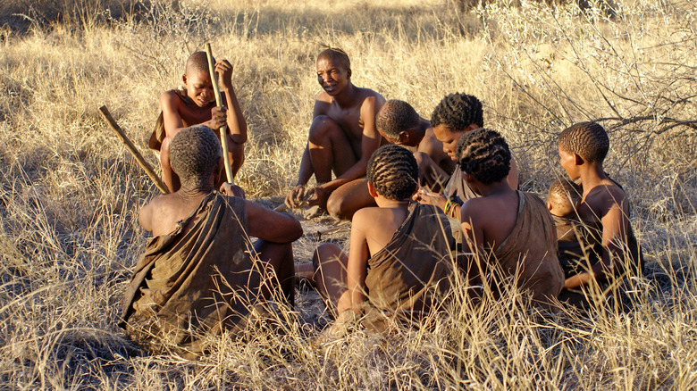 Khoisan hunters sitting together