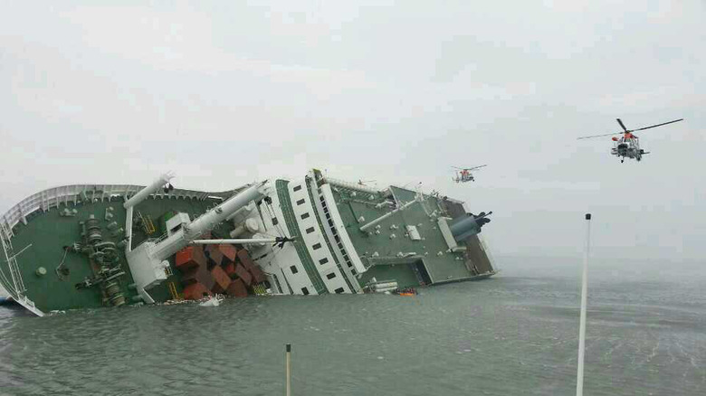 Rescue helicopters around the sinking ferry