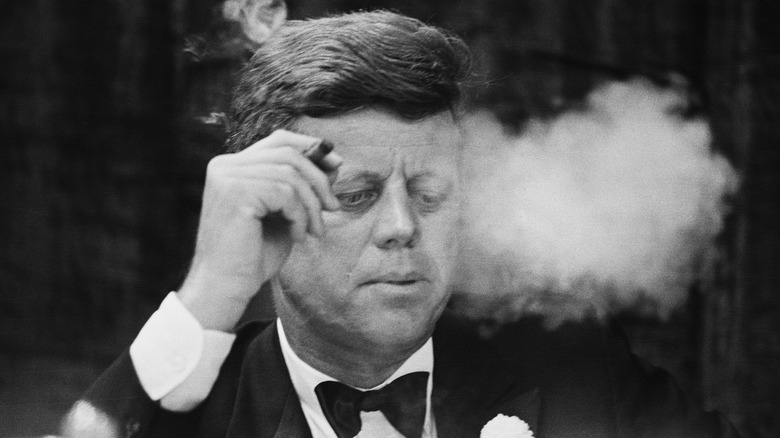 President Kennedy exhales