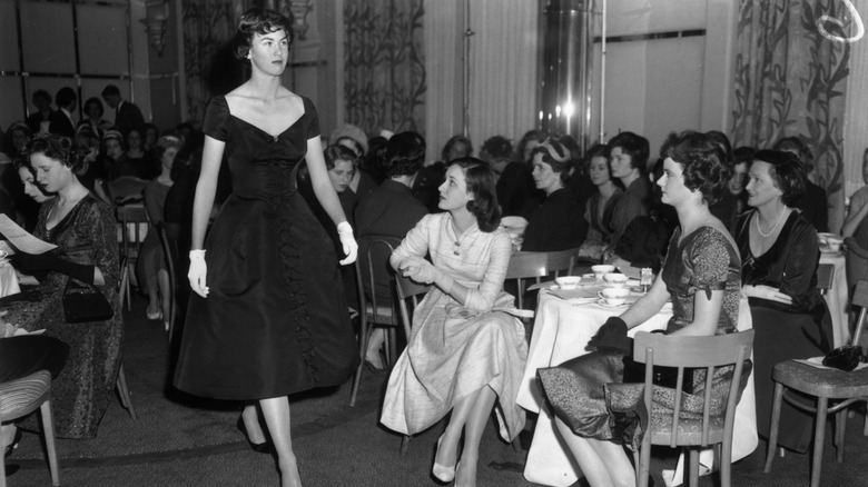 Elfrida Eden, niece of ex-prime minister Sir Anthony Eden, models a dress by Pierre Cardin at the Berkeley Debutante Dress Show