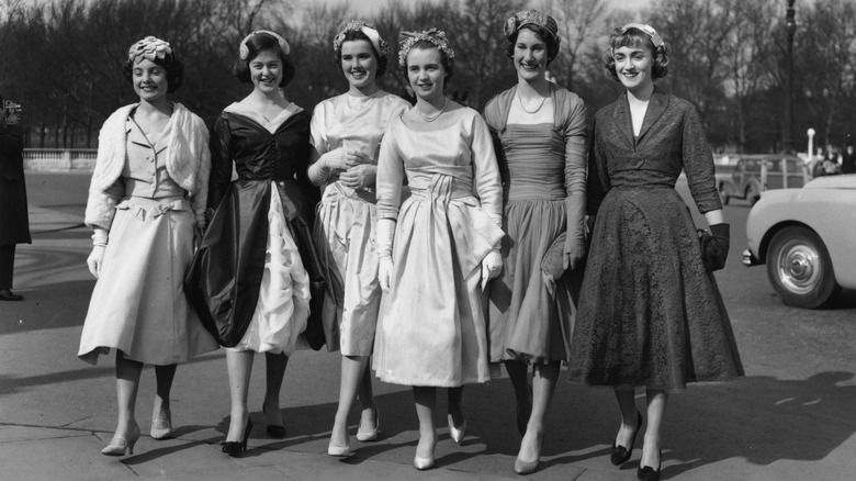 From left to right, Princess Alexa, A group of debutantes arriving at Buckingham Palace, London, for a presentation party 1958ndra, the Queen Mother, Angus Ogilvy, Prince Philip, Princess Anne, Queen Elizabeth II, unknown, at the start of the Epsom Derby, UK, 2nd June 1971