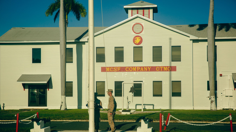 soldier in front of guantanamo bay base