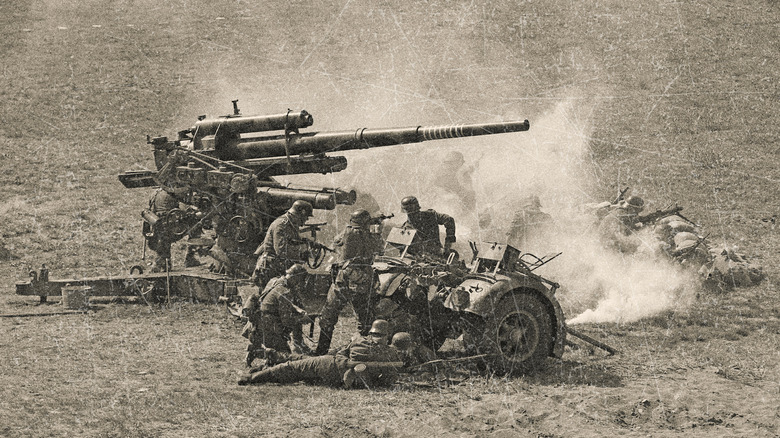 WWII German Artillery Soldiers shooting 88mm gun on D Day.