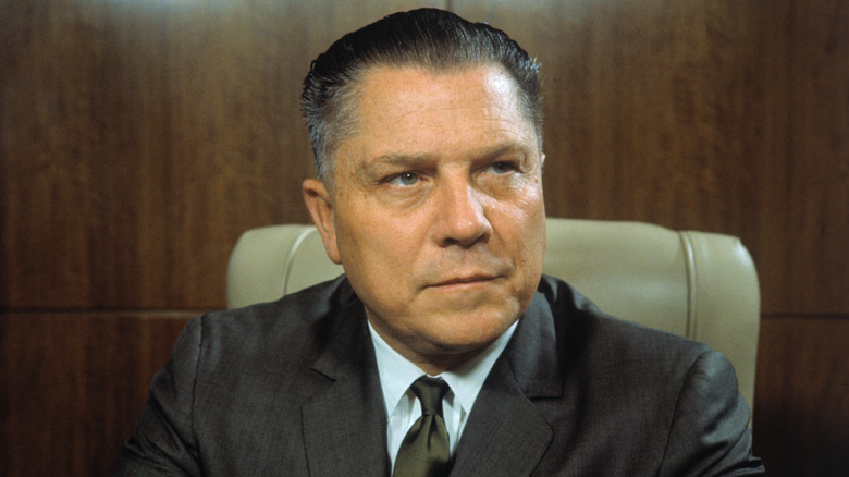 Jimmy Hoffa looks left