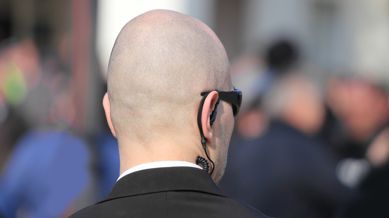 secret service agent seen from behind