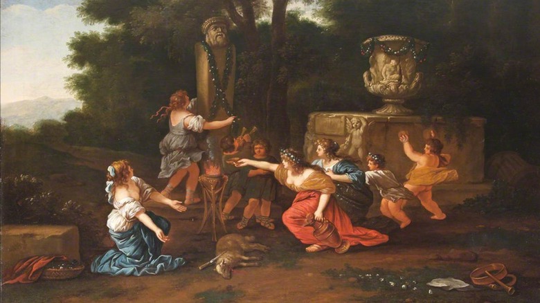 Maenads dancing and decoarting a statue