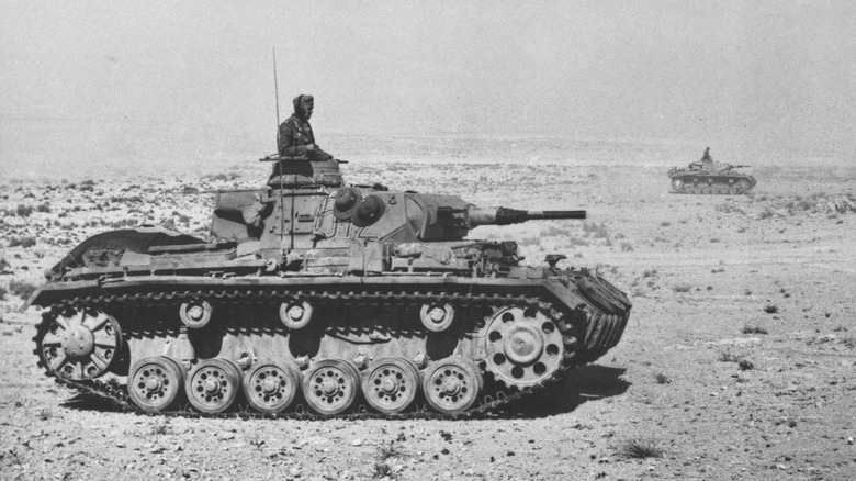 German tanks roll through a desert