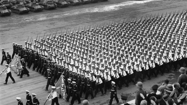 Nazi troops march down street