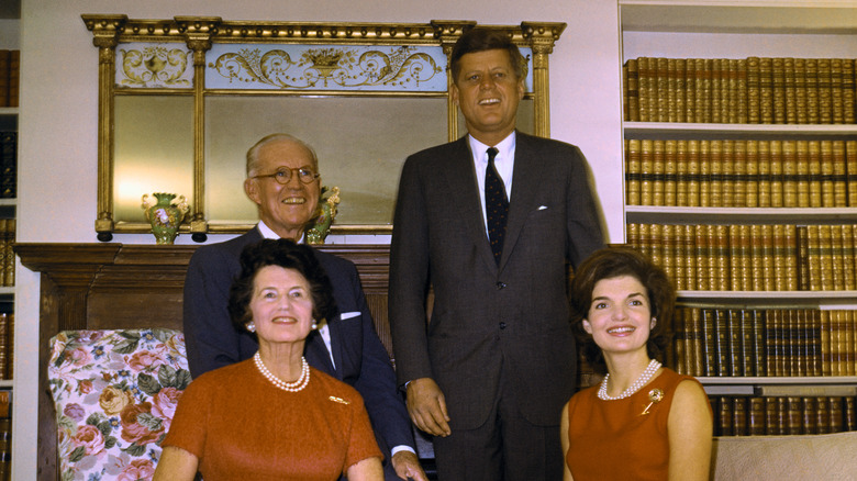 Kennedy family smiling together inside