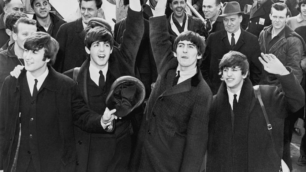 The Beatles arriving in America 1964