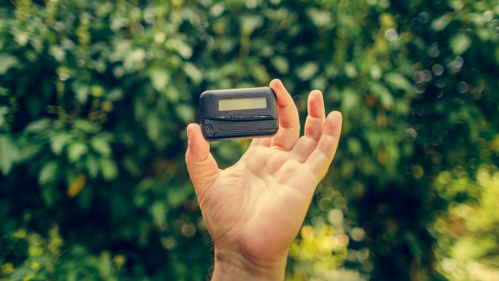 Hand holding a pager