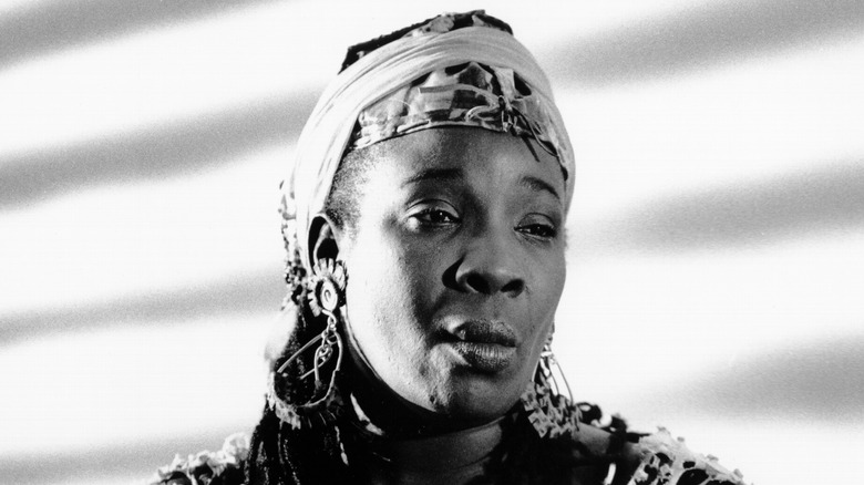 Rita Marley cloth hat solemn white background