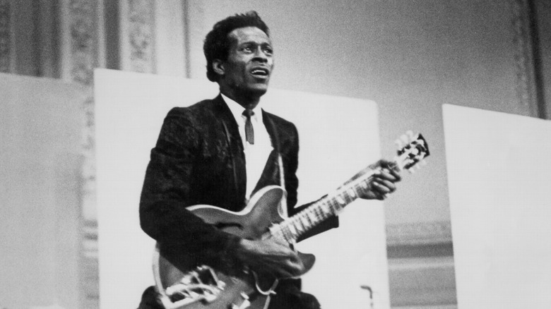 Chuck Berry playing his guitar