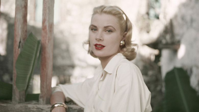 Grace Kelly in white with red lipstick