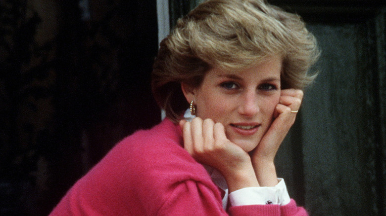 Princess Diana sitting on the stoop