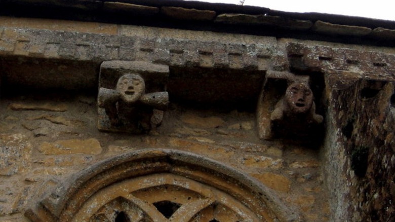 Sheela-na-gig stone carvings in shadow