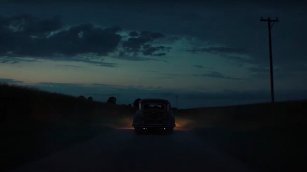 Uncle George, Atticus, and Leti driving at night