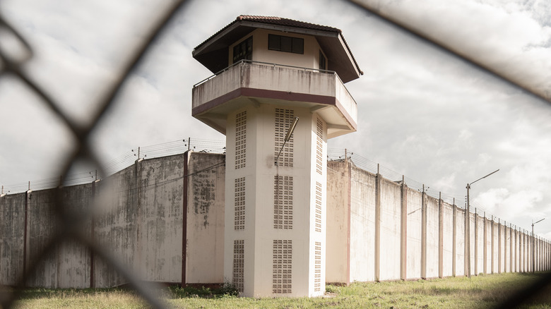 Prison behind fence