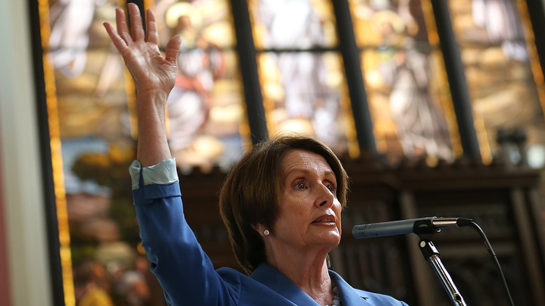 Nancy Pelosi speaks in a church