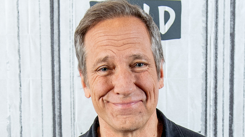 Mike Rowe offers a sheepish grin