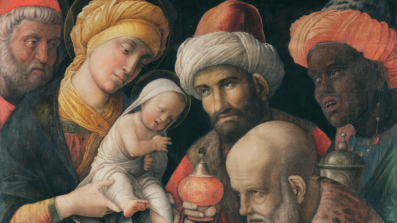 Magi adore baby Jesus in Virgin Mary' arms