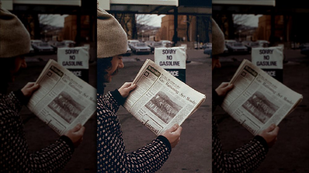 Man reads about gas shortages.