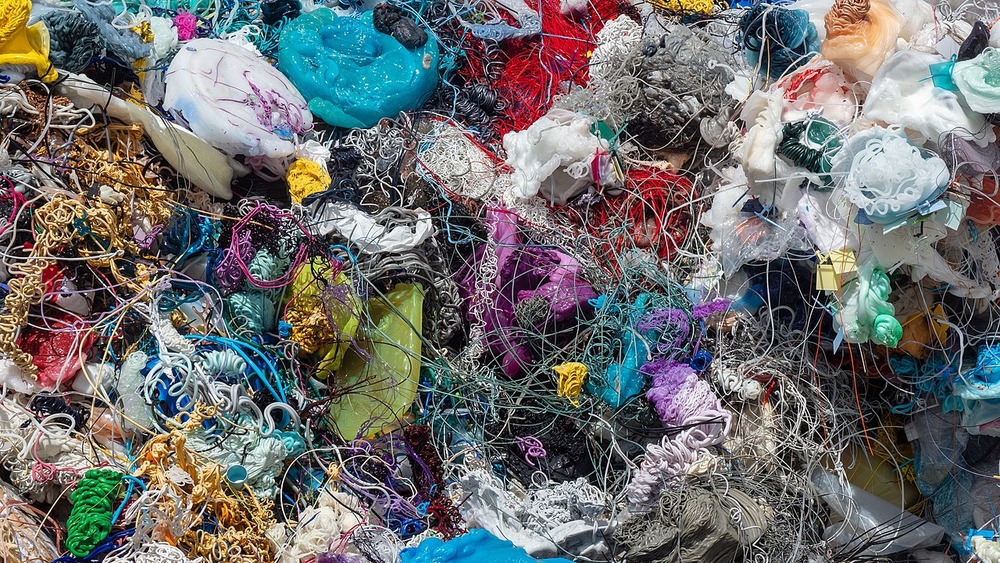 Remains from a plastics processing machine at a recycling centre