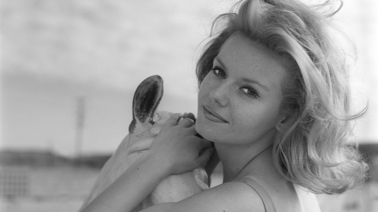 Actor Sharon Farrell posing on a beach