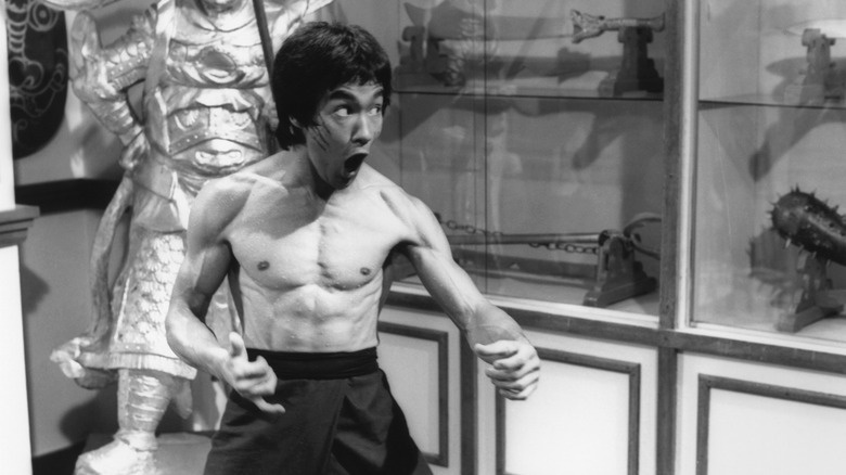 Bruce Lee screaming in a still from a film