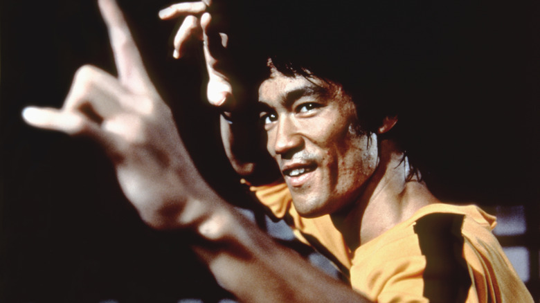 Bruce Lee performing a move with his hands in "Game of Death"