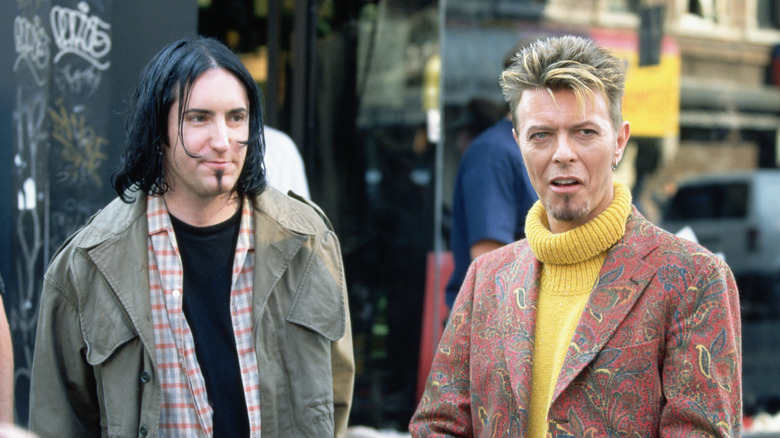 trent reznor and david bowie filming the video for i'm afraid of americans