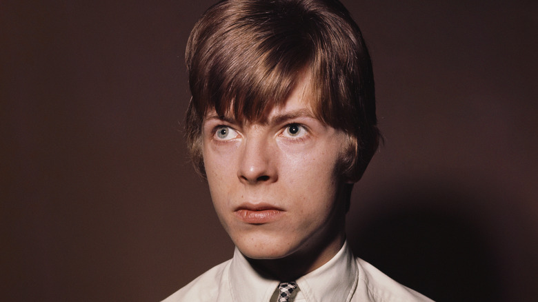 david bowie in shirt and tie in 1960s