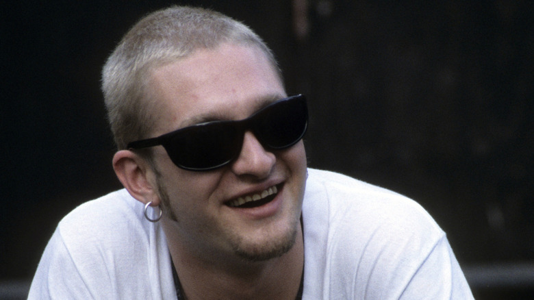 layne staley smiling with sunglasses and earring