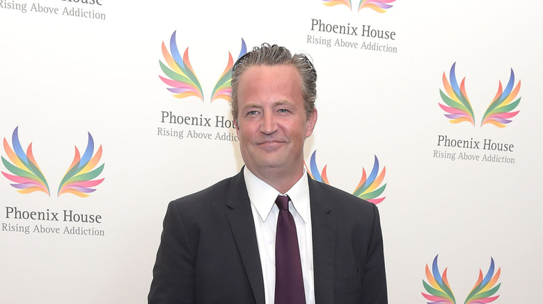 matthew perry smirking at phoenix house event