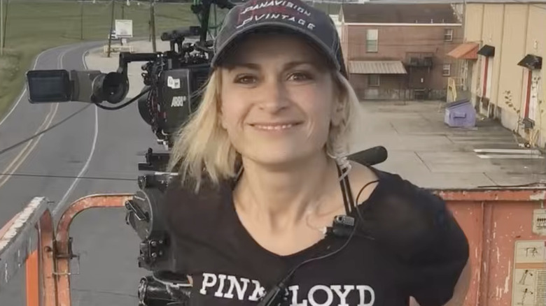 halyna hutchins smiling on set of rust pink floyd shirt