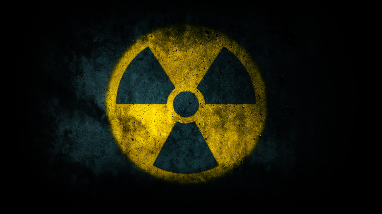 yellow radiation symbol dark background