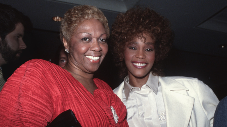 Cissy and Whitney Houston smiling