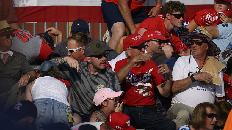 Trump rally crowd taking cover